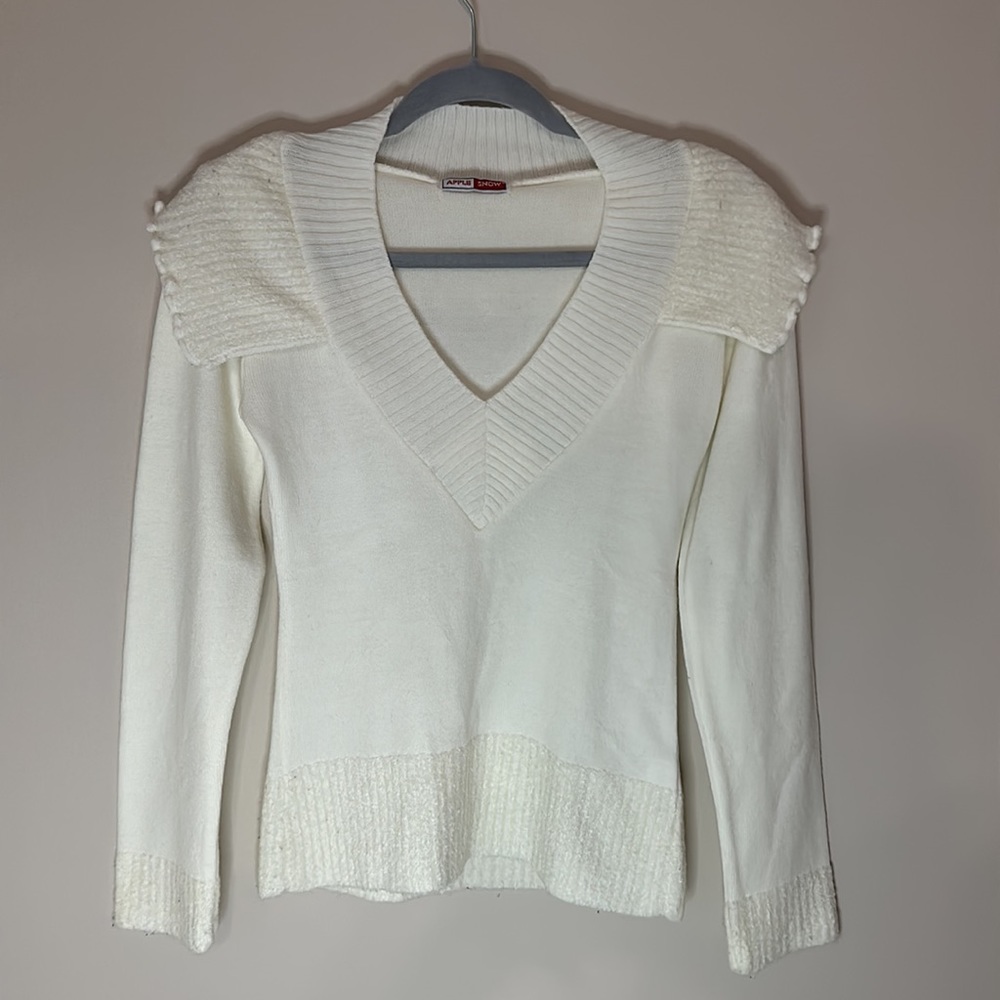 White sweater with a nice color